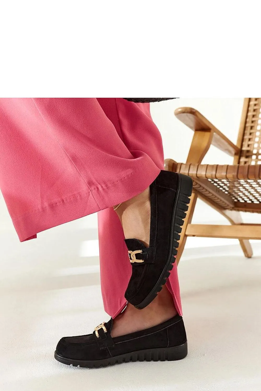 Black suede moccasins with a buckle