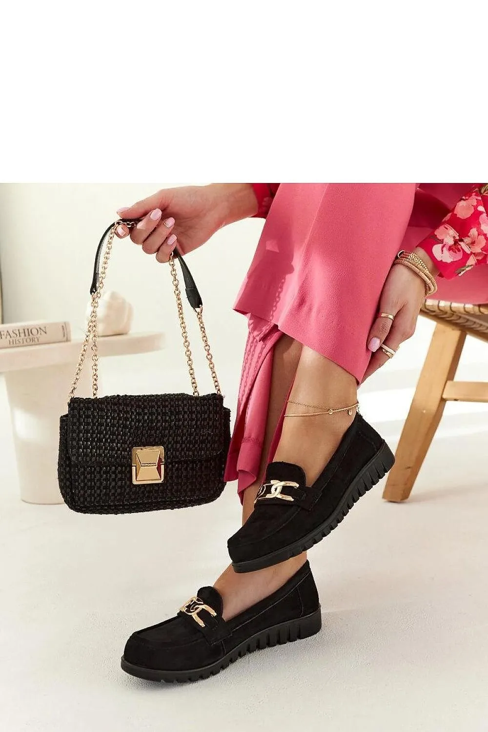 Black suede moccasins with a buckle
