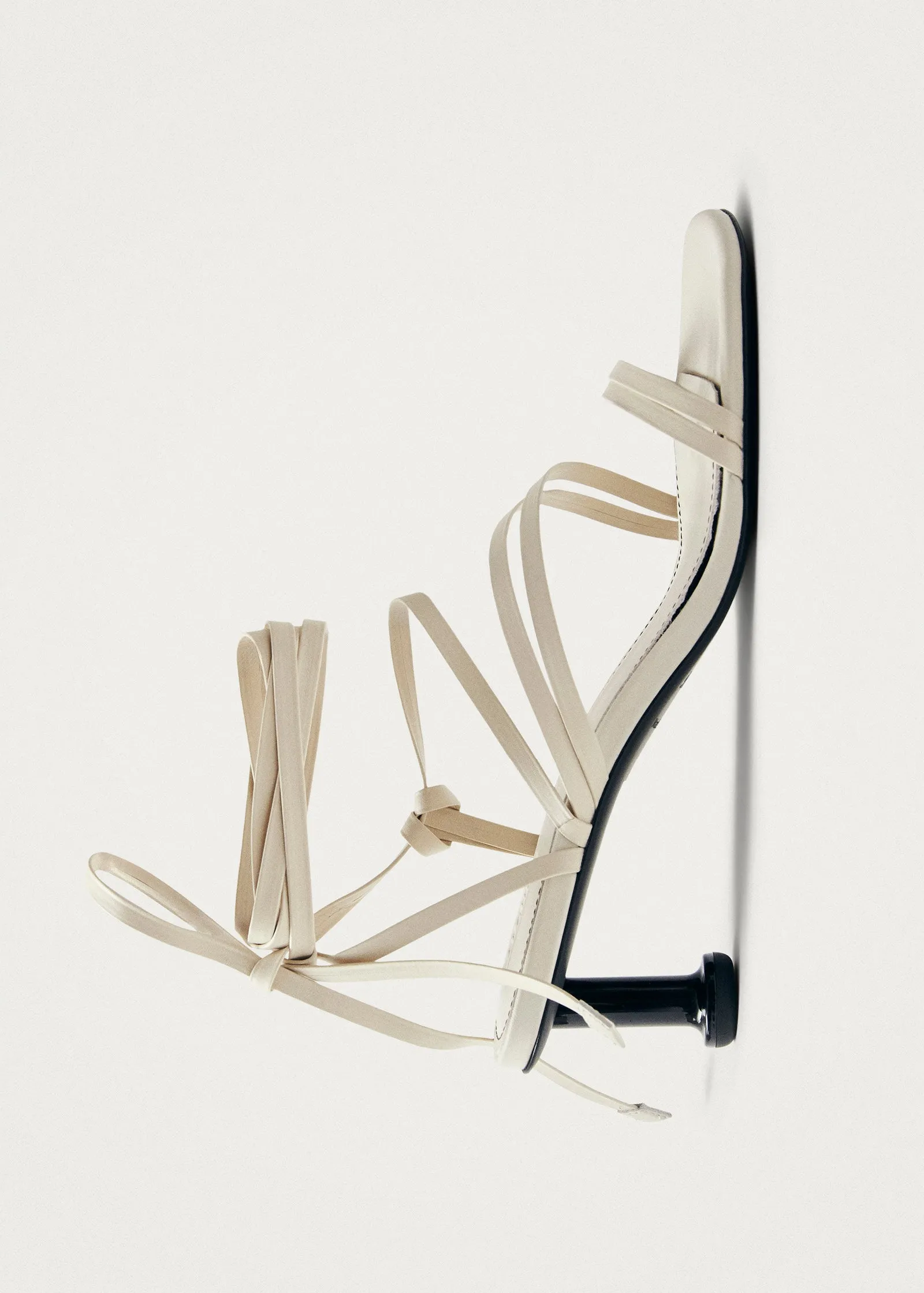 Curly Cream Leather Sandals